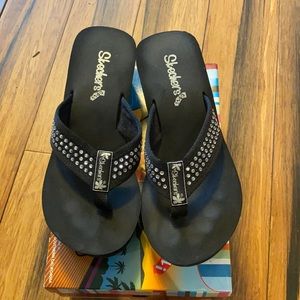 black SKECHERS sandals